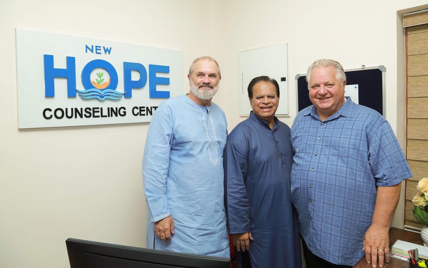 IGO President Valson Abraham (center) leads dedication of the New Hope Counseling Center at India Bible College and Seminary.  Pastors Amos Dodge and Dennis Gallaher, close friends of the school, participated in the dedication.