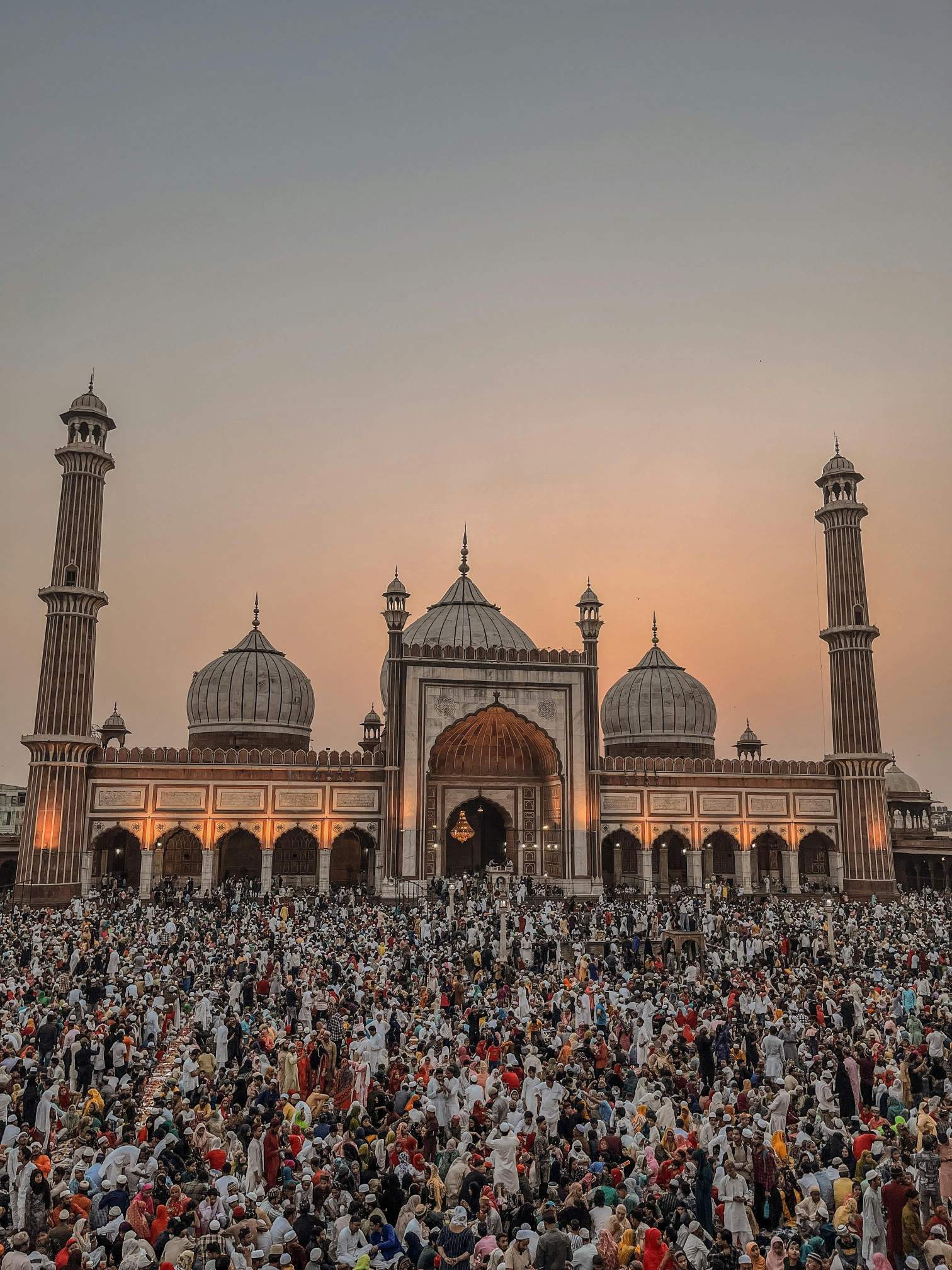 A crowd gathers around Jama Masjid, one of India’s largest and most prominent mosques, located in Delhi.